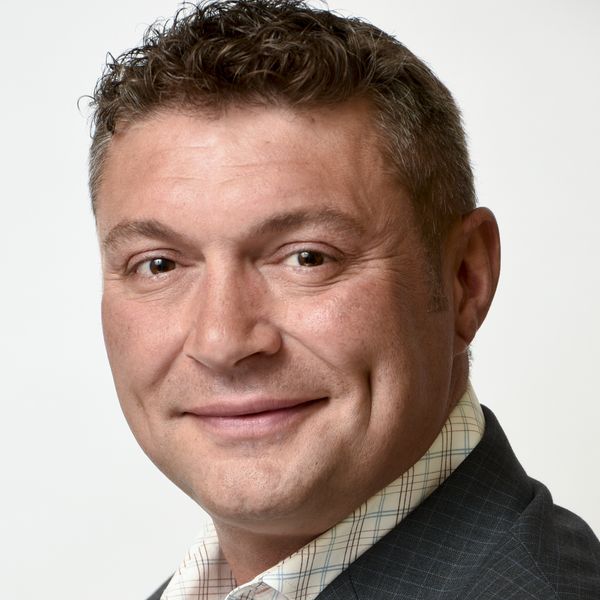 Michael Trache, Associate
